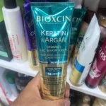 کرم ترمیم کننده مو بیوکسین حاوی کراتین و آرگان حجم ۲۵۰ میلی‌لیتر
