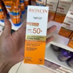 کرم ضد آفتاب رنگی بیوکسین SPF+50 مخصوص پوست مختلط و چرب ۵۰ میل